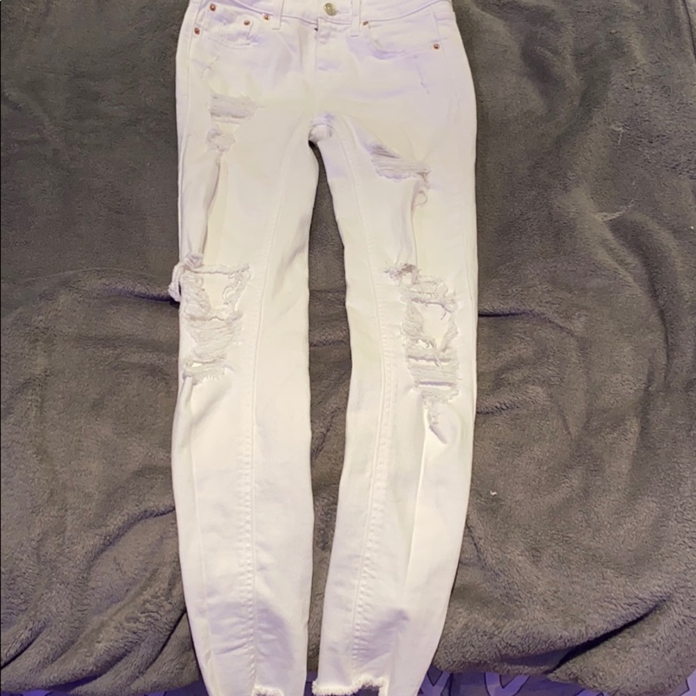 White ripped jeans